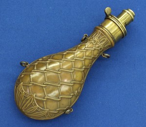 A fine antique 19th Century Embossed English Powder Flask, signed 