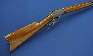A fine antique American Marlin Model 1891 second variation Lever Action 32 rimfire Rifle with 24 inch octagonal barrel. Length 103cm. In near mint condition. Price 2.600 euro.