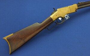 A scarce antique American Civil War lever action Henry Rifle. 24 inch barrel with clear address. Caliber 44 Rimfire. Length 112cm. In very good condition, Price on request