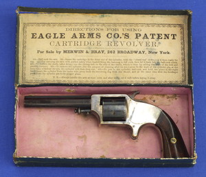 A very fine antique American Eagle Arms Plant's Front loading cup-primed Pocket Revolver in it's original hinge top box. 6 shot, .30 caliber, length 20,5 cm, in near mint condition. Price 2.900,- euro