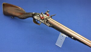 A very nice  and scarce antique Dutch 18th Century Double Barreled Flintlock Sporting Gun by J.Tomson Rotterdam, caliber 16 mm, length 123 cm, in very good condition. 