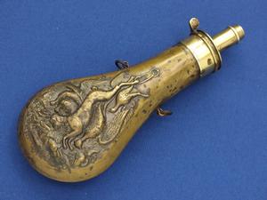 A very nice antique 19th Century American Embossed Powderflask by AM.FLASK & CAP CO, (Waterbury Conn.) height 21,5 cm, in  very good condition. Price 345 euro