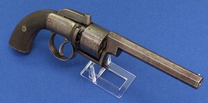 A very nice antique engraved English 6 shot .38 bore Transitional double action Percussion Revolver by B. Cogswell, 224 Strand London. Length 30cm. In very good condition. Price 1.250 euro