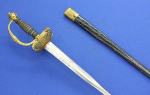 A very nice Antique French Small Sword, circa 1750, colichmarde blade, original fire-gilded hilt with silver wire, length 98 cm, in mint condition. 
