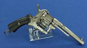 A very nice Antique Liege 12 shot Pinfire Revolver in 7 mm Caliber. Length 24 cm. In good condition. Price 1.275,-