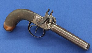 An antique English 19th century circa 1850.Box-Lock percussion double barreled pistol. By George Adams. Caliber 12mm. Length 25,5cm. In very good condition. Price 950 euro.