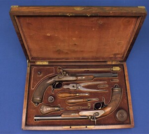 An excellent antique cased pair of Argentinian percussion pistols by L.Ambrosini Buenos Aires owned by Nicolas L. Vlahovich minister of Justice of first republic of La Boca. In near mint condition. 