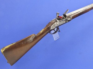 A 18th century French Military Flintlock Musket marked on barrel with Crown over NC for Nicolas Carteron and the St Etienne mark of 1730-50 era. Kaliber 18mm, length 143cm. In very good condition. Price 1850,- euro