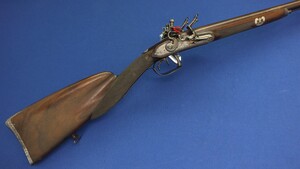 A Belgian Double barreled Flintlock Sportin Rifle by Michel Berleur Liege (1780-1810) With rainproof pan's with safety covers released by a spring-catch at the front of the steels. Caliber 15mm. Length 122cm. In very good condition. Price 2.950 euro