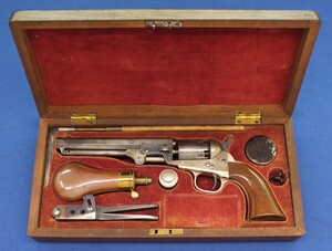 A fine and rare Cased antique American 6 shot percussion Pocket Revolver by August G. Genez  New York. Caliber 31. 6 inch engraved barrel with signature: A.G. GENEZ, GUNSMITH, 9 CHAMBERS STR. NY.  In very good condition. 