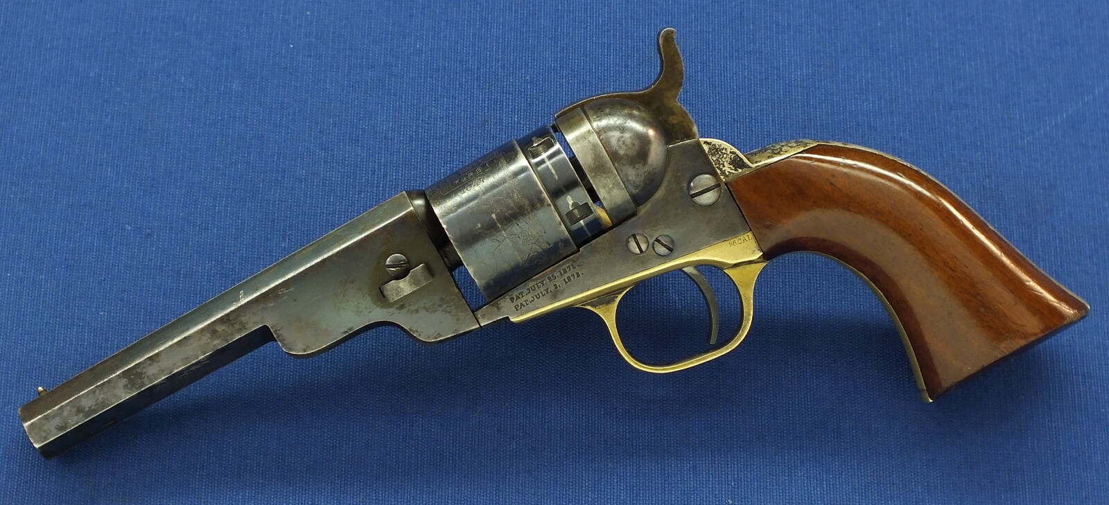 A fine antique American Colt Model 1862 Pocket Navy Conversion Revolver. 4 1/2 inch Octagon Barrel, .38 Rimfire caliber, 5 shot, length 26,5 cm in very good condition. Price 3.250 euro