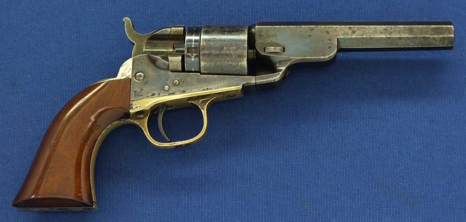 A fine antique American Colt Model 1862 Pocket Navy Conversion Revolver. 4 1/2 inch Octagon Barrel, .38 Rimfire caliber, 5 shot, length 26,5 cm in very good condition. Price 3.250 euro