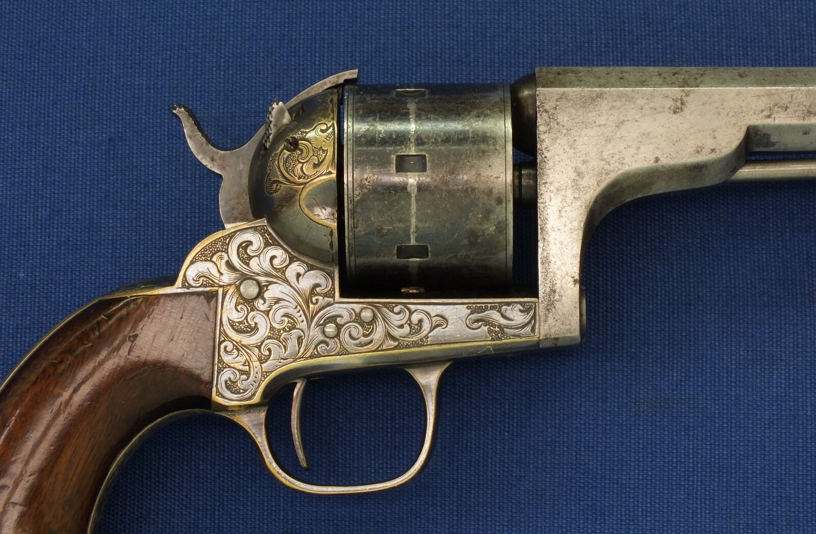 A fine antique American Moore's Patent Firearms Co Single Action Belt Revolver. 7 shot, Caliber 32 Rimfire. 6 inch octagon Barrel with clear address. Length 29cm. In very good condition