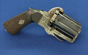 A fine antique French engraved 6 shot Double Action Pinfire Pepperbox. 8mm caliber. Length 17cm. In very good condition. Price 850 euro.