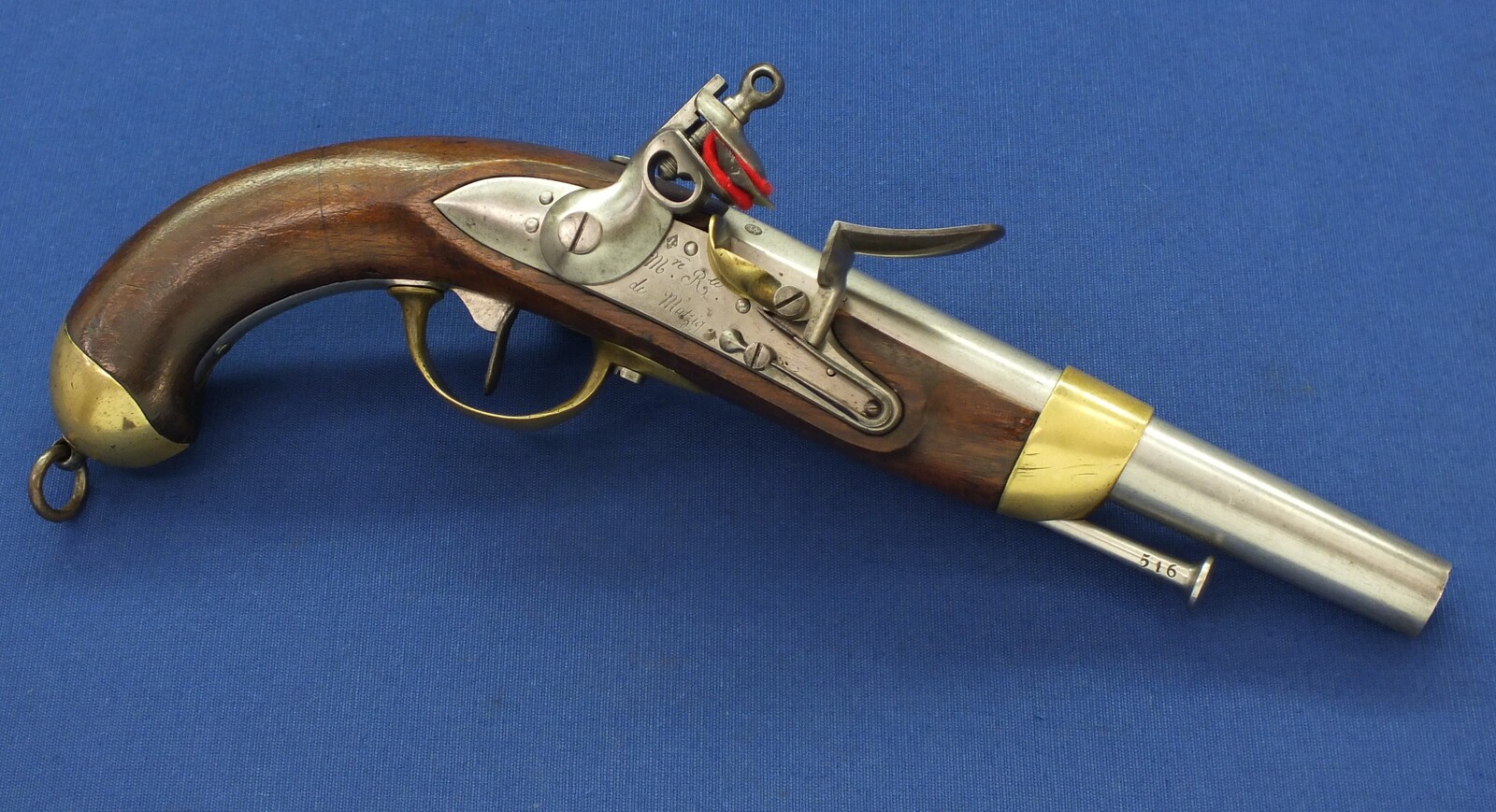 A fine antique French Military Model 1816 Troupe Cavalry Flintlock Pistol. Signed Manufacture Royal de Mutzig. Nr 516 all matching. Caliber 17mm, length 36,5cm. In very good condition. Price 2.750 euro.