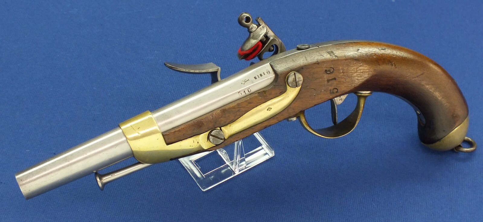 A fine antique French Military Model 1816 Troupe Cavalry Flintlock Pistol. Signed Manufacture Royal de Mutzig. Nr 516 all matching. Caliber 17mm, length 36,5cm. In very good condition. Price 2.750 euro.