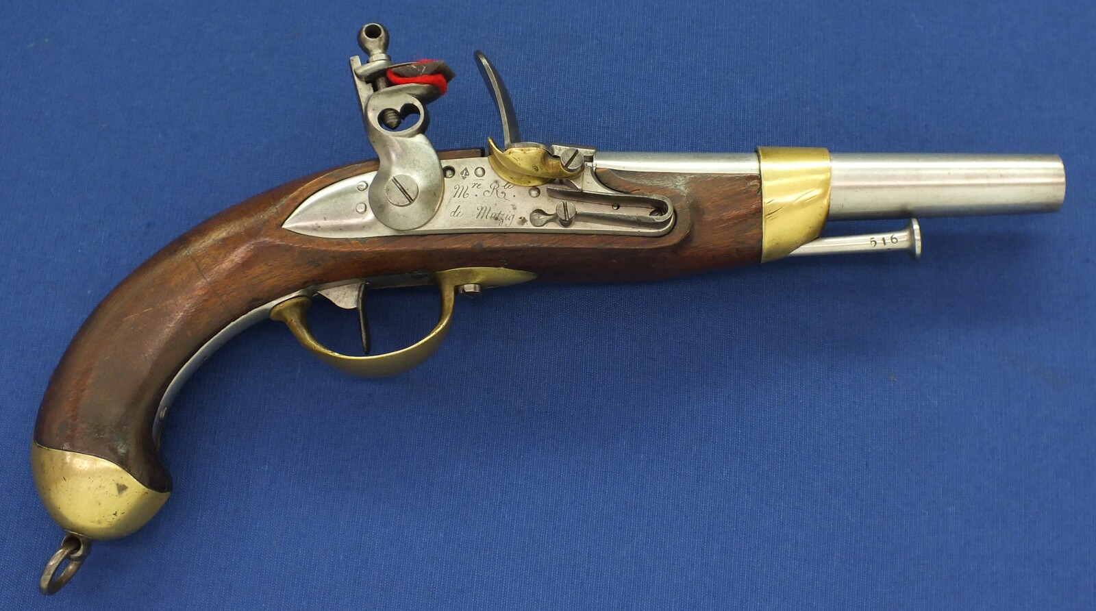 A fine antique French Military Model 1816 Troupe Cavalry Flintlock Pistol. Signed Manufacture Royal de Mutzig. Nr 516 all matching. Caliber 17mm, length 36,5cm. In very good condition. Price 2.750 euro.