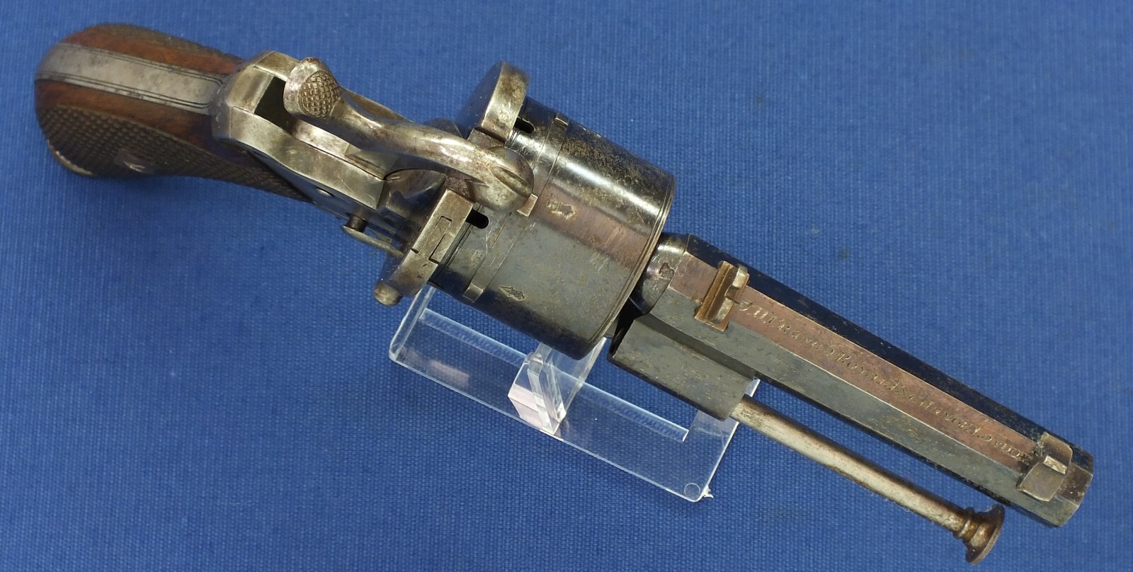 A fine antique Liege August Francotte Single&Double Action 6 shot 9mm Lefaucheux patent Pinfire revolver for the English market. Retailed by: J.F Crane, 3 Royal Exchange London. Length 23cm. In very good condition. Price 950 euro