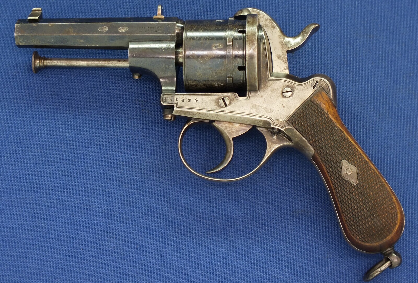 A fine antique Liege August Francotte Single&Double Action 6 shot 9mm Lefaucheux patent Pinfire revolver for the English market. Retailed by: J.F Crane, 3 Royal Exchange London. Length 23cm. In very good condition. Price 950 euro