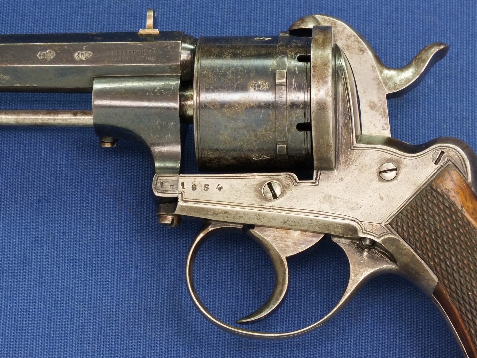 A fine antique Liege August Francotte Single&Double Action 6 shot 9mm Lefaucheux patent Pinfire revolver for the English market. Retailed by: J.F Crane, 3 Royal Exchange London. Length 23cm. In very good condition. Price 950 euro