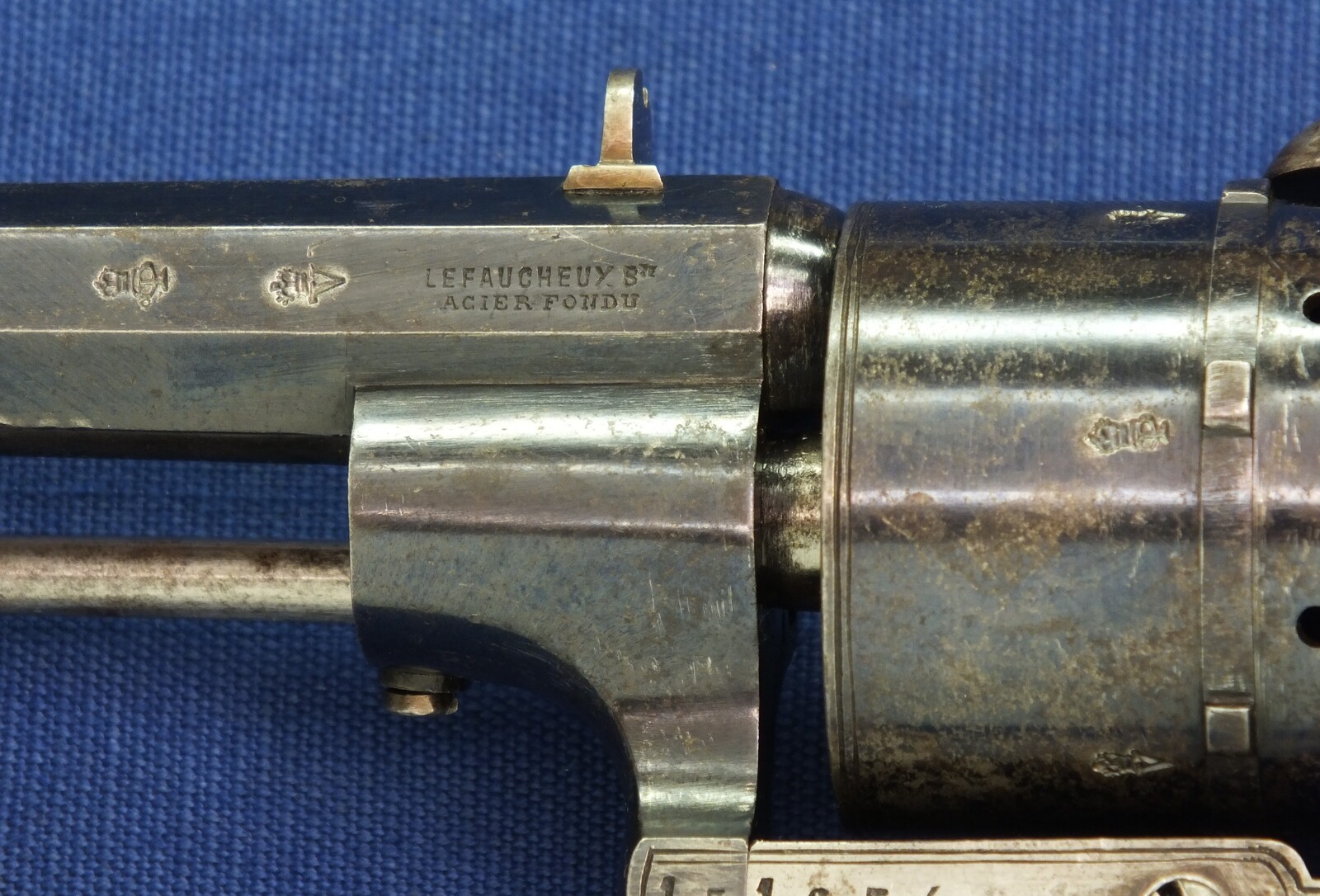 A fine antique Liege August Francotte Single&Double Action 6 shot 9mm Lefaucheux patent Pinfire revolver for the English market. Retailed by: J.F Crane, 3 Royal Exchange London. Length 23cm. In very good condition. Price 950 euro