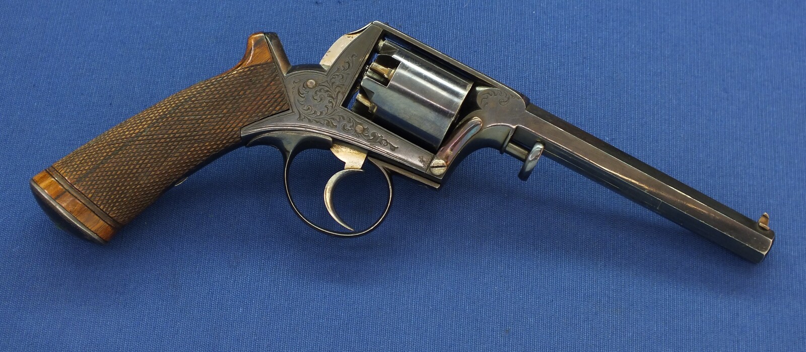 A fine antique probably Belgian made Adams Patent 5 shot double action percussion revolver. 38 Caliber. 5 inch barrel. Length 29cm. In near mint condition. 