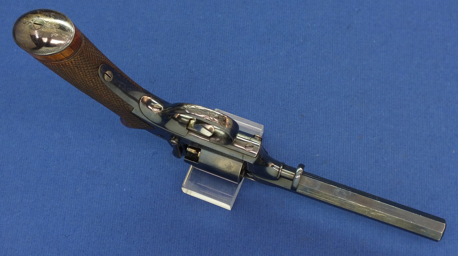 A fine antique probably Belgian made Adams Patent 5 shot double action percussion revolver. 38 Caliber. 5 inch barrel. Length 29cm. In near mint condition. 