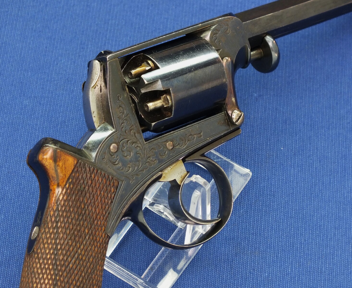 A fine antique probably Belgian made Adams Patent 5 shot double action percussion revolver. 38 Caliber. 5 inch barrel. Length 29cm. In near mint condition. 