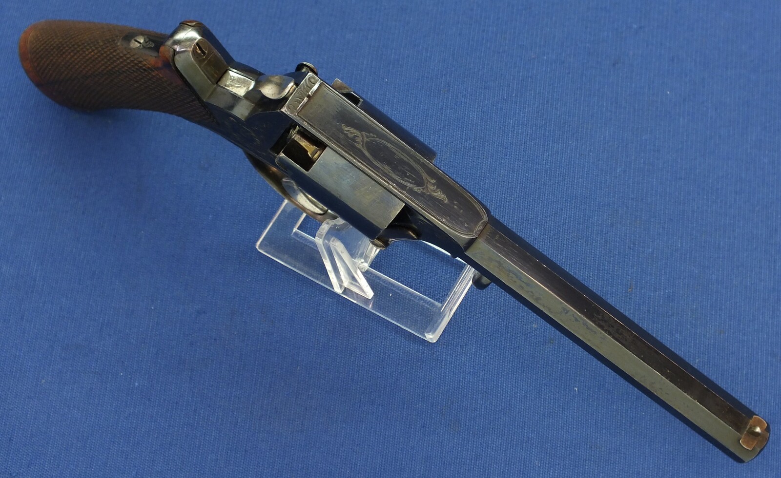 A fine antique probably Belgian made Adams Patent 5 shot double action percussion revolver. 38 Caliber. 5 inch barrel. Length 29cm. In near mint condition. 