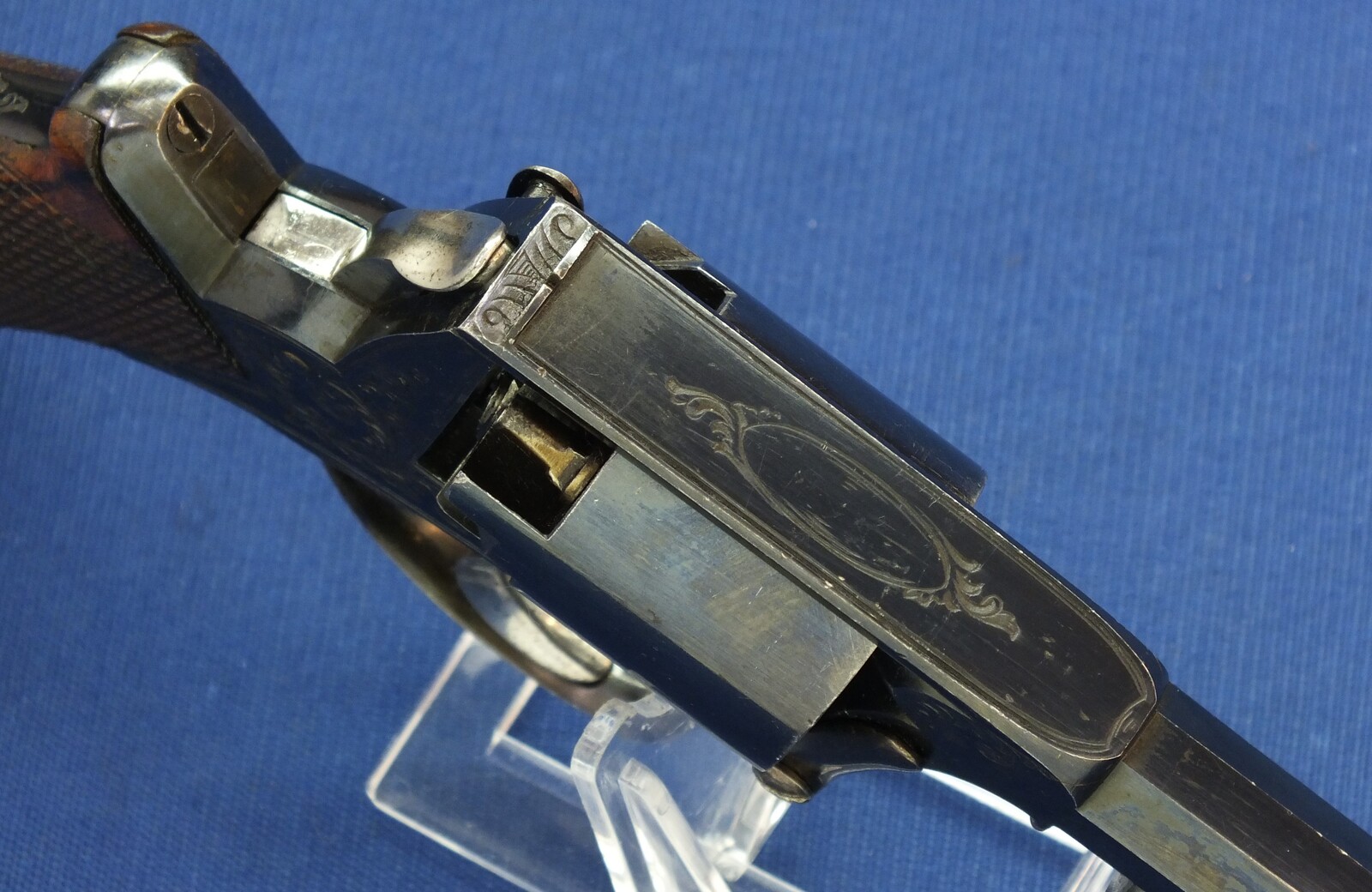 A fine antique probably Belgian made Adams Patent 5 shot double action percussion revolver. 38 Caliber. 5 inch barrel. Length 29cm. In near mint condition. 