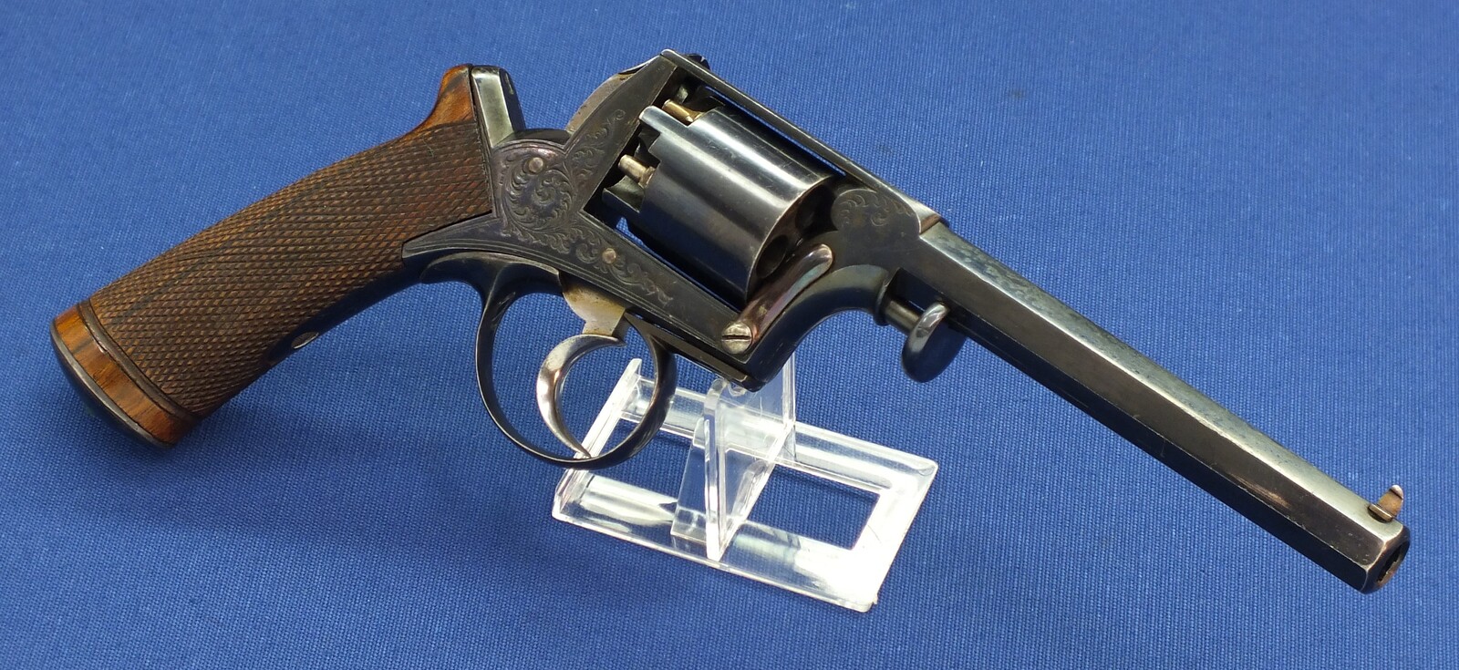 A fine antique probably Belgian made Adams Patent 5 shot double action percussion revolver. 38 Caliber. 5 inch barrel. Length 29cm. In near mint condition. 