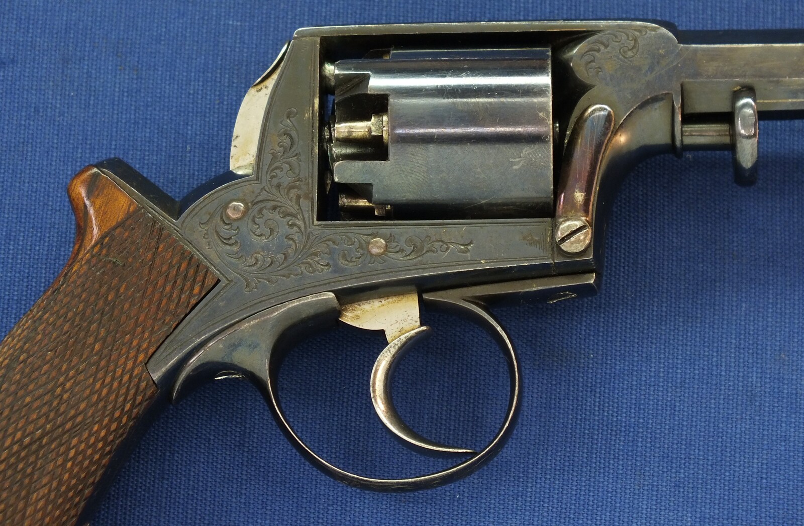 A fine antique probably Belgian made Adams Patent 5 shot double action percussion revolver. 38 Caliber. 5 inch barrel. Length 29cm. In near mint condition. 