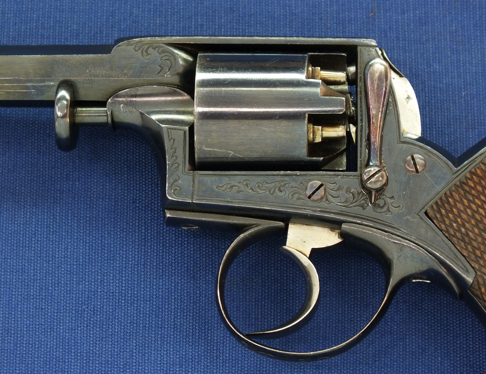 A fine antique probably Belgian made Adams Patent 5 shot double action percussion revolver. 38 Caliber. 5 inch barrel. Length 29cm. In near mint condition. 