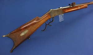 A fine antique Swiss Martini breechloading Stutzer-Rifle by J.L. Schwarz in Bern belonging to Emil. Probst Architekt Bern. Caliber 41 Swiss Center and Rimfire. Ribbed octagonal Barrel of 87,5cm. Length 133cm. In very good condition. Price 1.950 euro