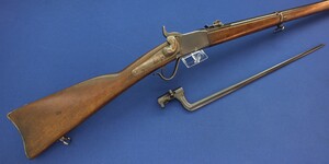 A fine Antique Swiss Peabody Rifle Model 1867-77 with bayonet. Caliber 41 Swiss Rimfire. Length 132cm. In near mint condition. Price 1.750 euro