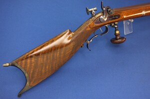 A fine antique Swiss percussion Target Rifle by Henri Léo Fleuriel Senevay in Neuchatel (1809-51). Caliber 10,5mm. 85,5cm octagonal Barrel. Length 126cm. In near mint condition. 