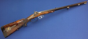 A fine German circa 1850 Double barreled combination sporting Gun by Morgenroth in Gernrode. Caliber 15,5mm Rifled and Smooth. Length 120cm. In very good condition. Price 6.500 euro.
