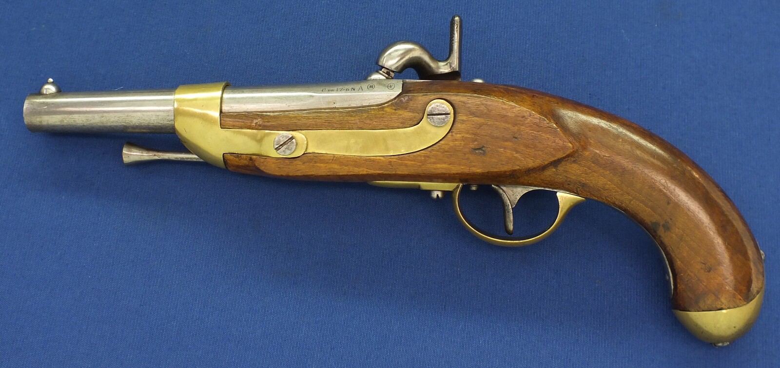 A rare antique Austrian model Augustin military Cavalry Percussion Pistol with altered French 1822 T-Bis barrel and hammer. Caliber 17.7mm. Length 39cm. In very good condition. Price 1.450 euro.