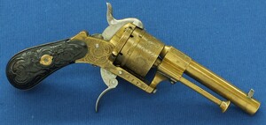 A rare antique Belgian Bronze 6 shot engraved Single and Double Action Pinfire Revolver. Caliber 7mm, length 20cm. In very good condition. Price 775 euro.