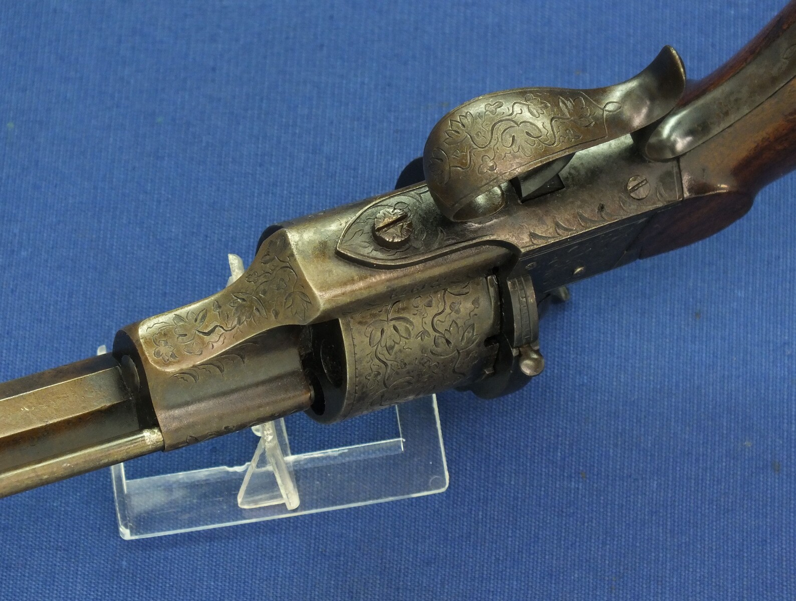 A rare antique French engraved early model 1854 Lefaucheux 6 shot single action 9mm Pinfire Revolver. 6 inch Full octagonal barrel. Length 31cm. In very good condition. 