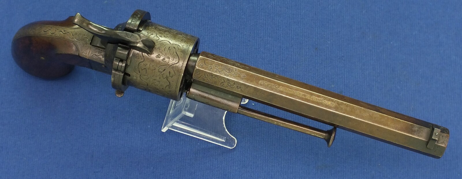 A rare antique French engraved early model 1854 Lefaucheux 6 shot single action 9mm Pinfire Revolver. 6 inch Full octagonal barrel. Length 31cm. In very good condition. 