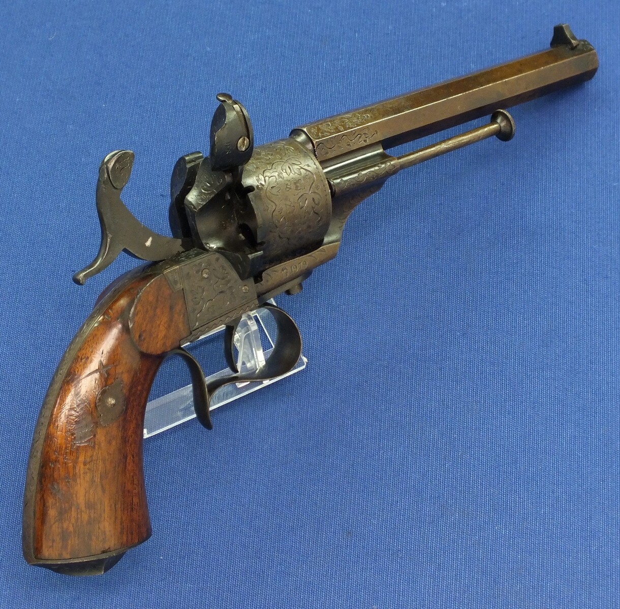 A rare antique French engraved early model 1854 Lefaucheux 6 shot single action 9mm Pinfire Revolver. 6 inch Full octagonal barrel. Length 31cm. In very good condition. 