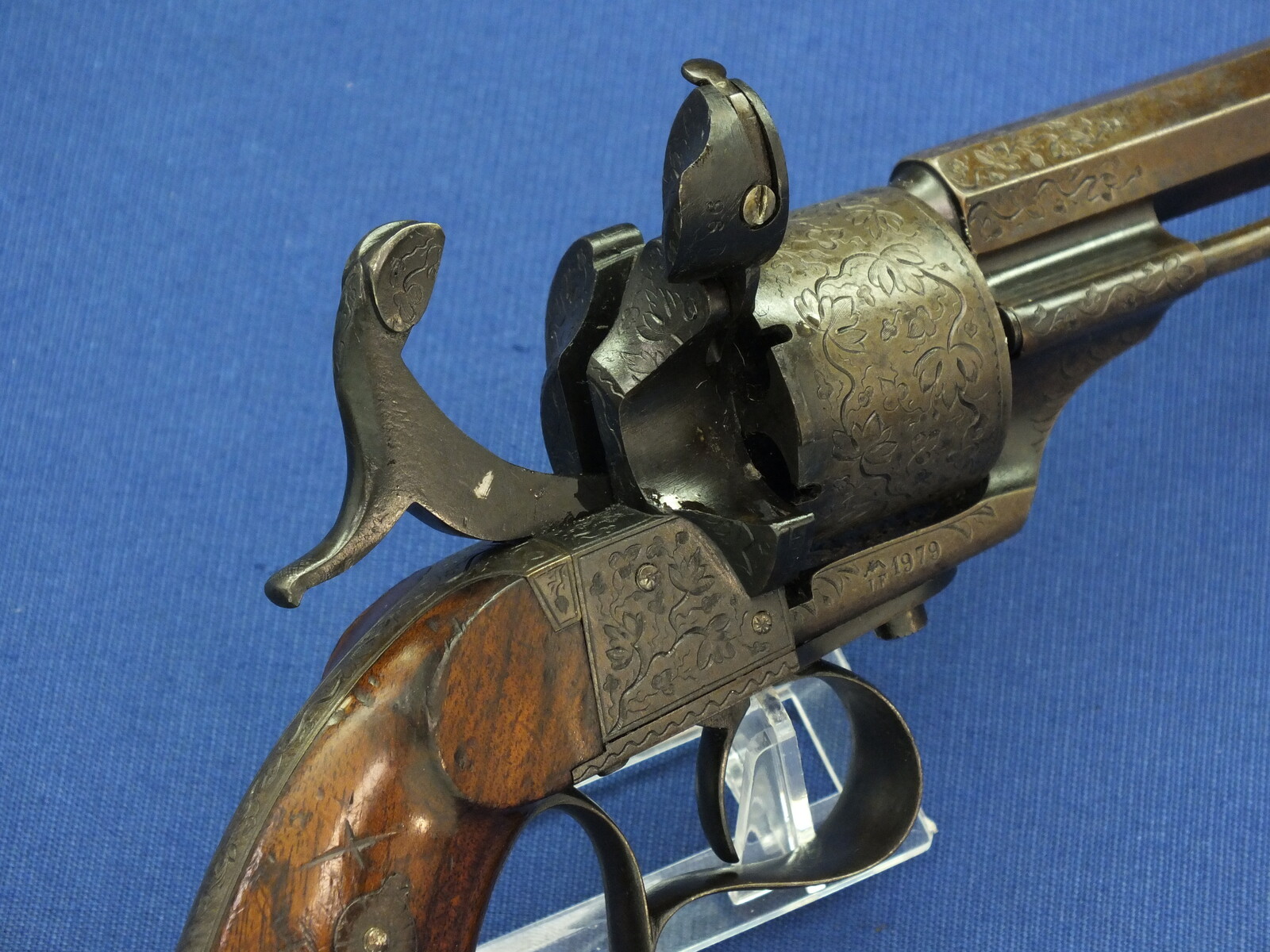 A rare antique French engraved early model 1854 Lefaucheux 6 shot single action 9mm Pinfire Revolver. 6 inch Full octagonal barrel. Length 31cm. In very good condition. 