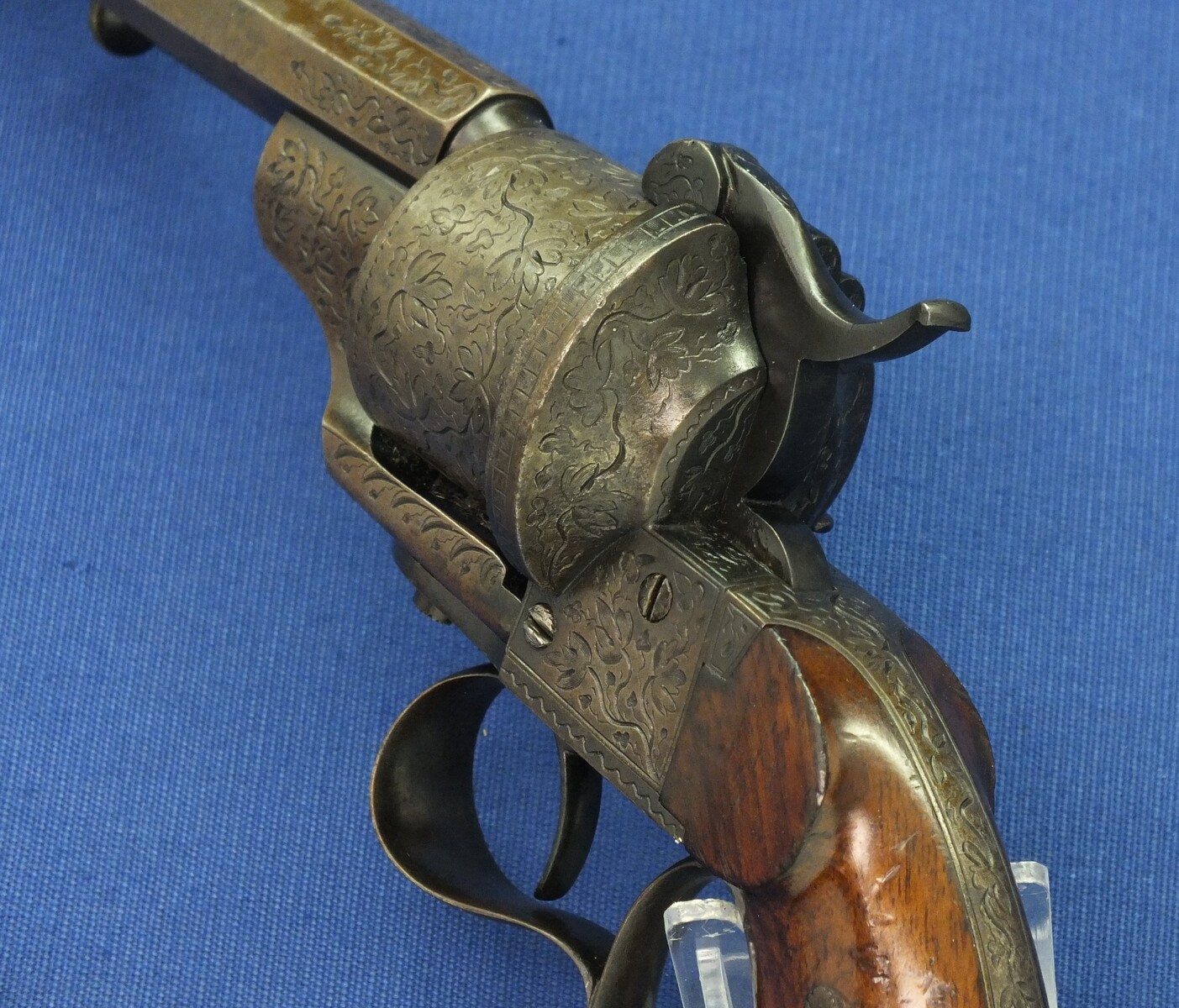 A rare antique French engraved early model 1854 Lefaucheux 6 shot single action 9mm Pinfire Revolver. 6 inch Full octagonal barrel. Length 31cm. In very good condition. 