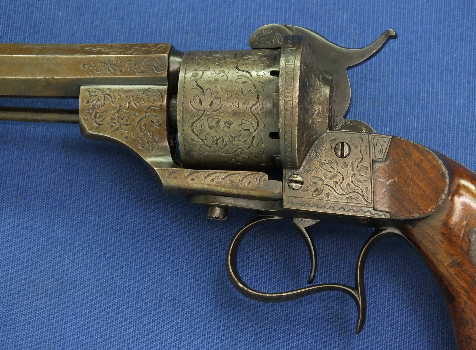 A rare antique French engraved early model 1854 Lefaucheux 6 shot single action 9mm Pinfire Revolver. 6 inch Full octagonal barrel. Length 31cm. In very good condition. 