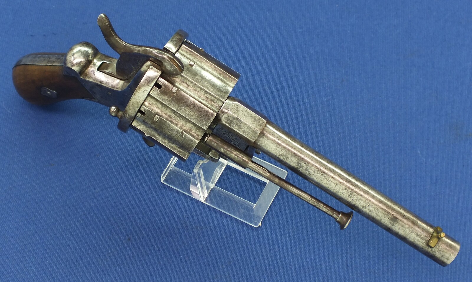 A rare antique German engraved 10 shot Single and Double Action Pinfire Revolver by Kirschbaum Solingen. 6 inch Barrel. Caliber 12mm. Length 30cm. In good/very good Condition. Price 1,350 euro