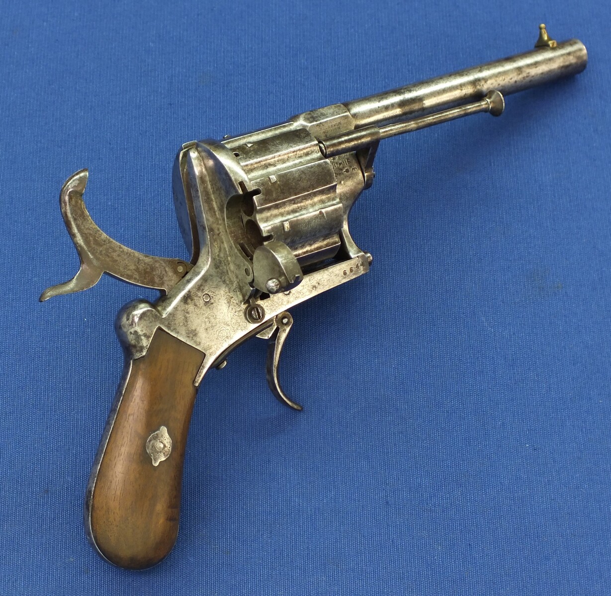 A rare antique German engraved 10 shot Single and Double Action Pinfire Revolver by Kirschbaum Solingen. 6 inch Barrel. Caliber 12mm. Length 30cm. In good/very good Condition. Price 1,350 euro