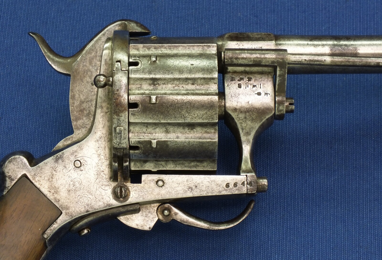 A rare antique German engraved 10 shot Single and Double Action Pinfire Revolver by Kirschbaum Solingen. 6 inch Barrel. Caliber 12mm. Length 30cm. In good/very good Condition. Price 1,350 euro