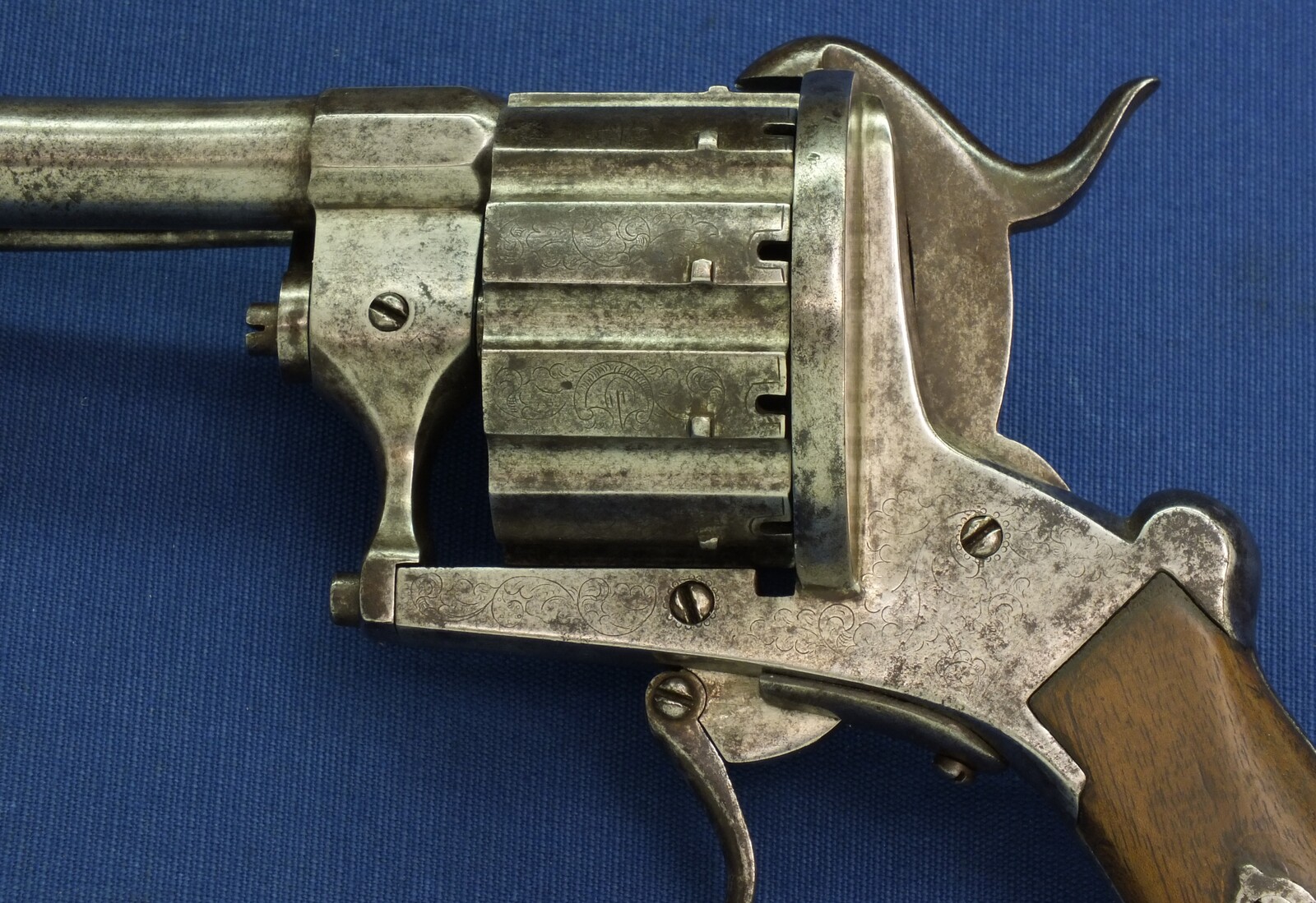 A rare antique German engraved 10 shot Single and Double Action Pinfire Revolver by Kirschbaum Solingen. 6 inch Barrel. Caliber 12mm. Length 30cm. In good/very good Condition. Price 1,350 euro