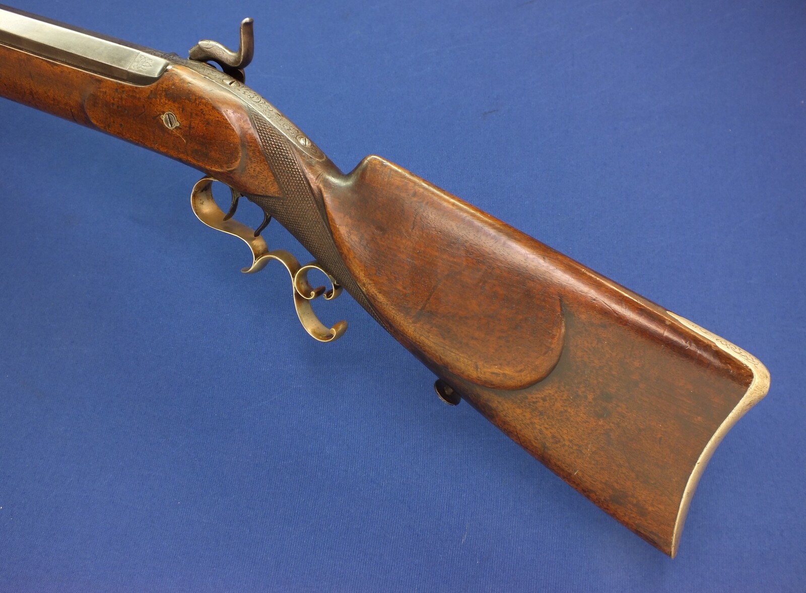 A very heavy German Target percussion Rifle by A. Andriessen Aachen. Caliber 18mm. 104cm/41 inch octagon Barrel. Length 143cm. In very good condition. Price 2.450 euro.